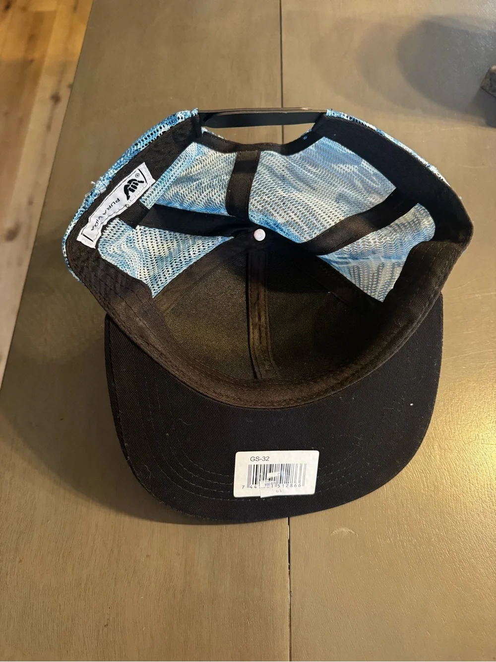 NWOT Pura Vida black & blue trucker hat, blue tie-dye mesh, adjustable band.